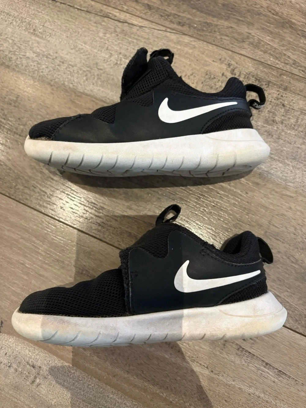 SOLD Nike Kids Black and White Slip-On Athletic Sneakers - Picture 2 of 6